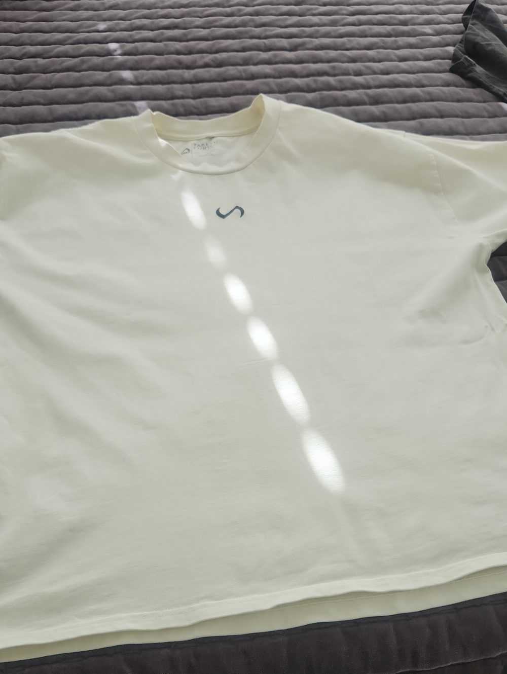 Men's Oversized Cream Short-Sleeve Tee with Subtle Chest Logo